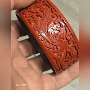 Vintage Wide Carved Cinnabar Bracelet Red Dragon Bird Design Carved Over Brass